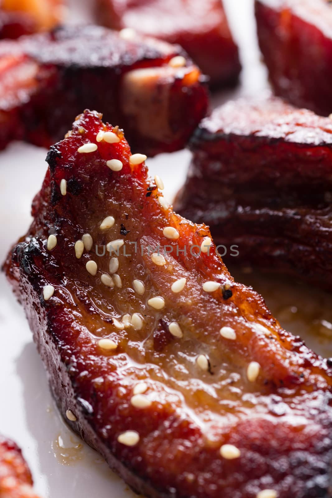 German style pork ribs on white plate