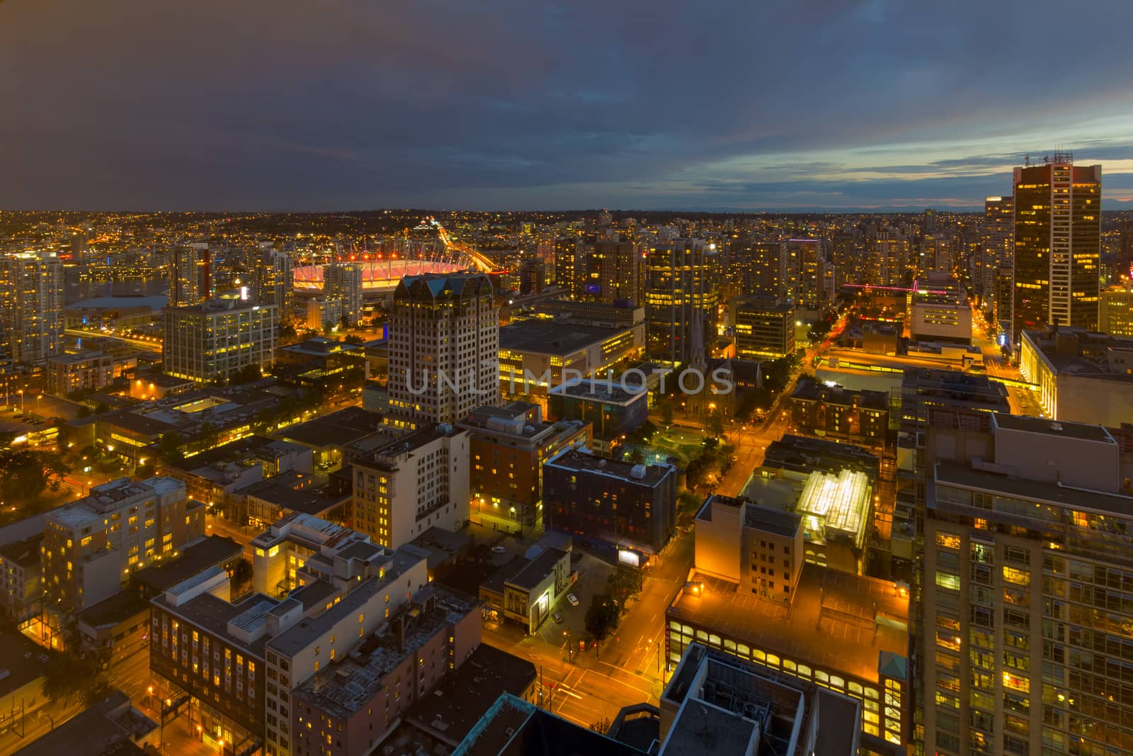 Vancouver British Columbia Canada downtown cityscape during evening blue hour twilight