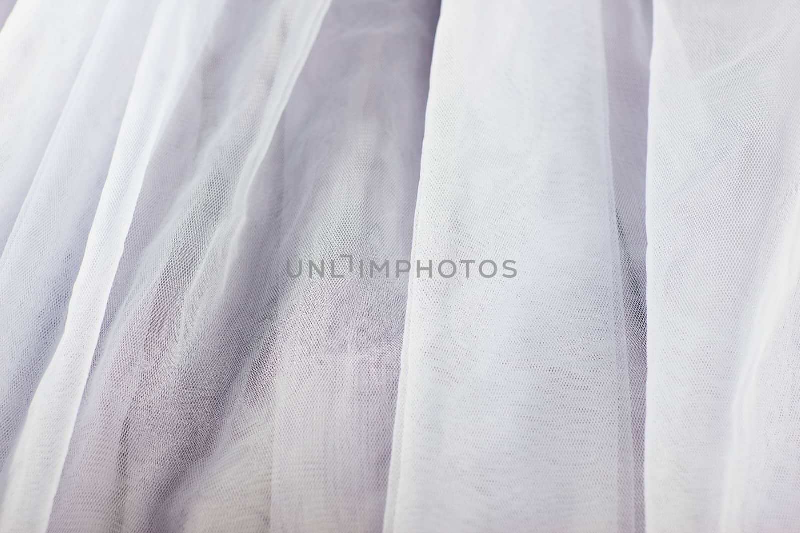 chiffon tulle fabric textured background. pleated skirt fabric texture. closeup plisse fabric texture pattern