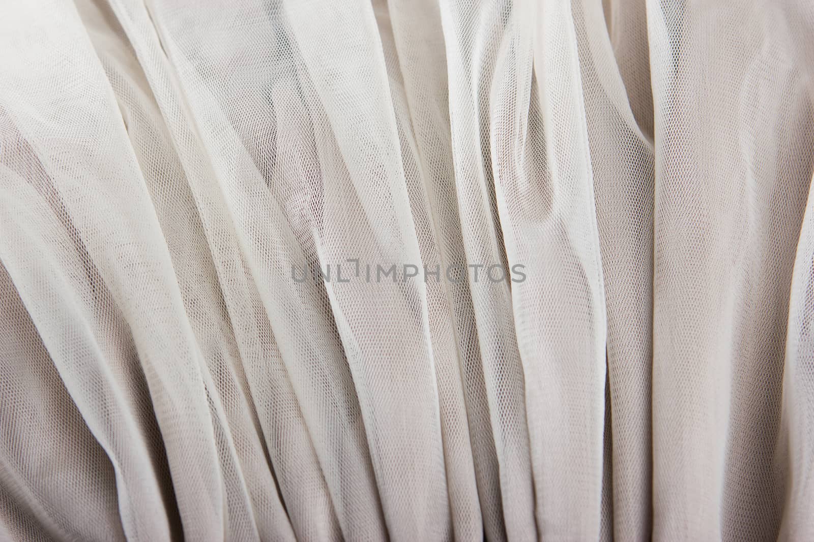 chiffon tulle fabric textured background. pleated skirt fabric texture. closeup plisse fabric texture pattern