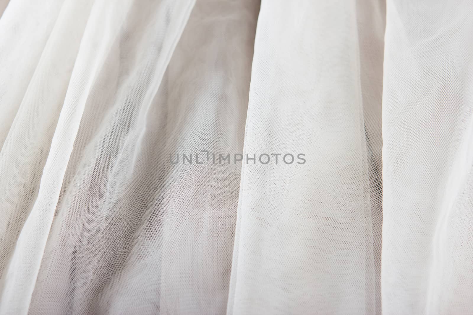 chiffon tulle fabric textured background. pleated skirt fabric texture. closeup plisse fabric texture pattern