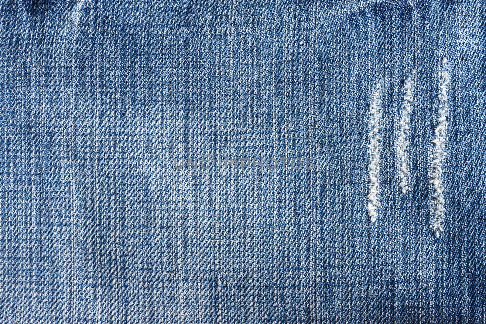 Jeans close-up, texture, torn, mopped pieces. by Tanacha