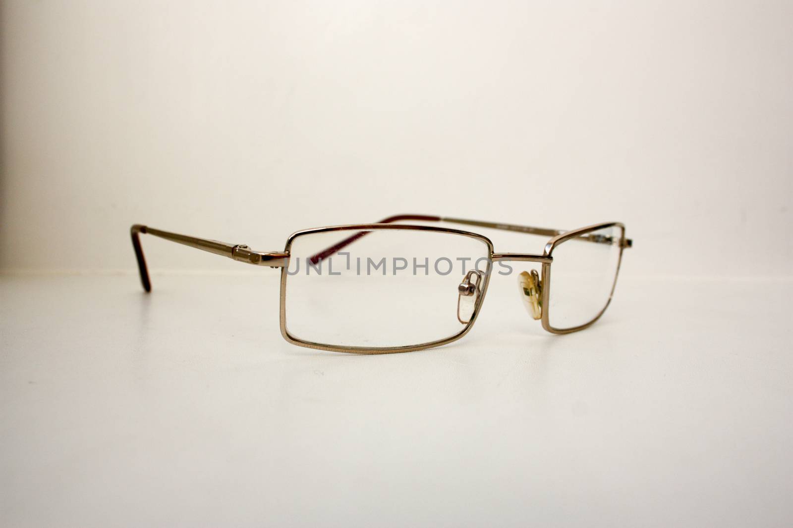 Glasses to lie. The concept of learning and business. on a white background. Photo for your design