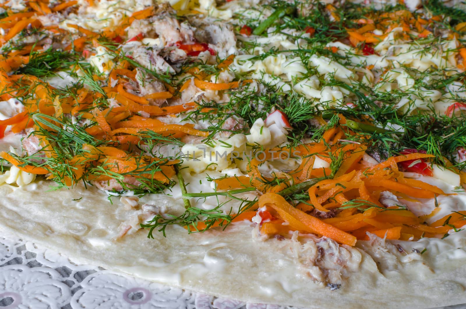 The pizza is ready for cooking, closeup