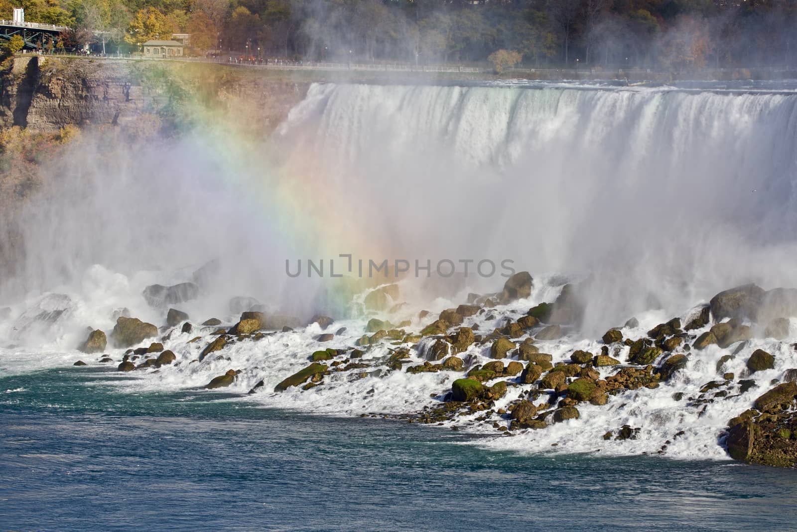 Beautiful image with amazing powerful Niagara waterfall and a rainbow by teo