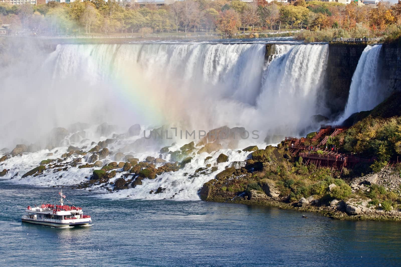 Beautiful background with amazing Niagara waterfall, rainbow, and a ship by teo