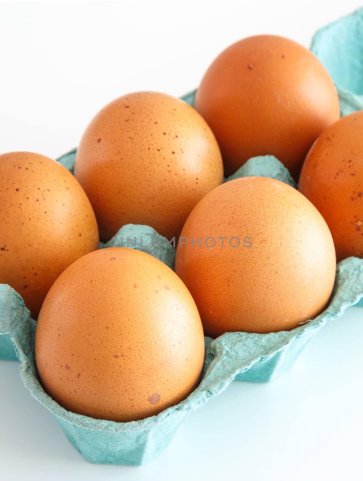 View of opened box of chicken eggs for market place