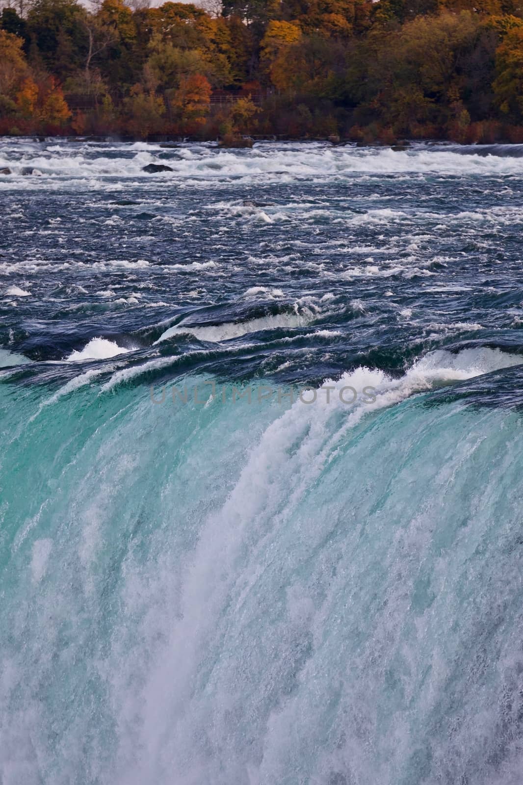 Beautiful closeup of amazing powerful Niagara waterfall by teo