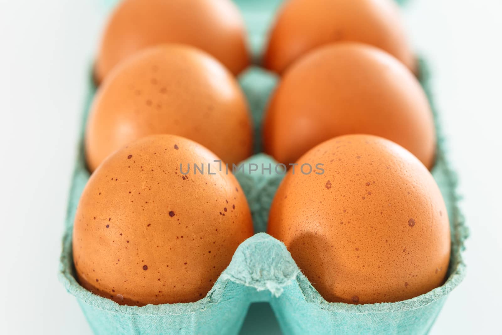 View of opened box of chicken eggs for market place