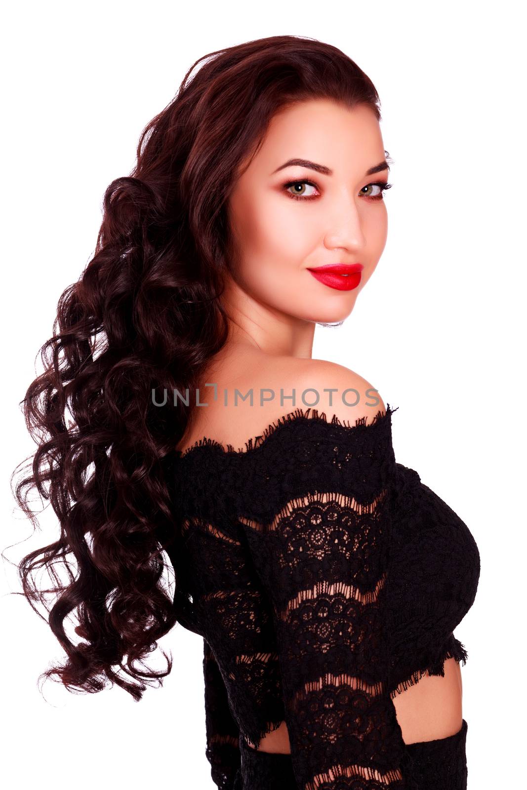 Young beautiful woman model with long hair wears evening black d by Nobilior