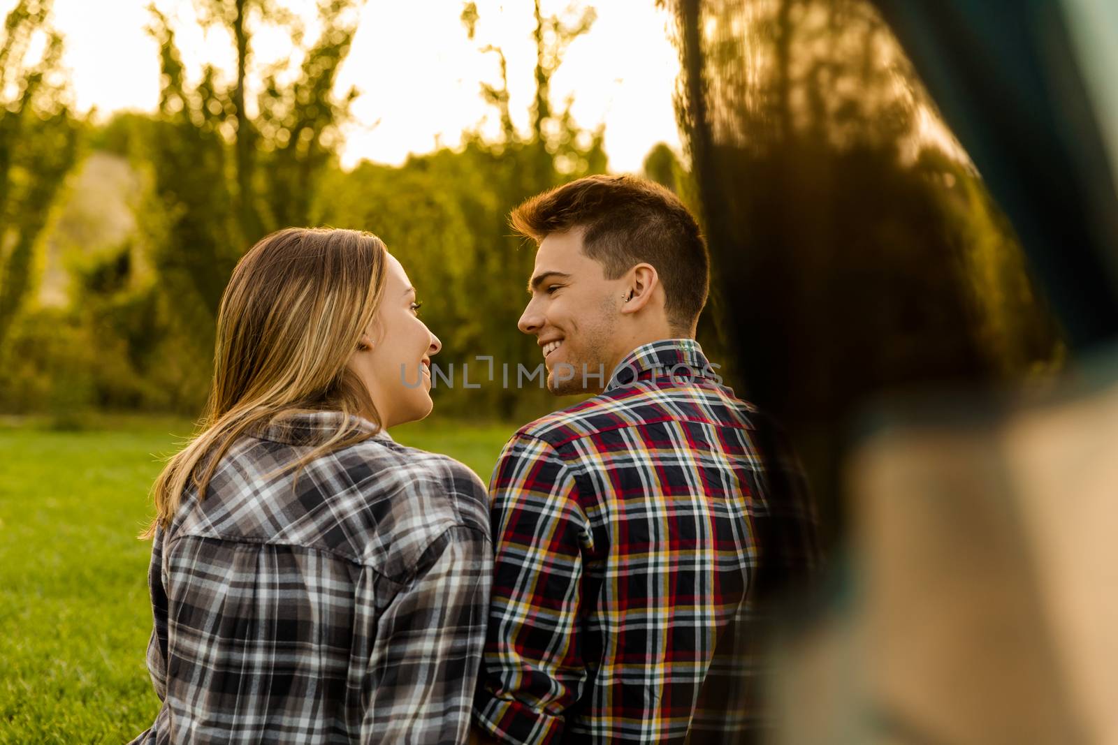 Shot of a happy couple camping on the nature