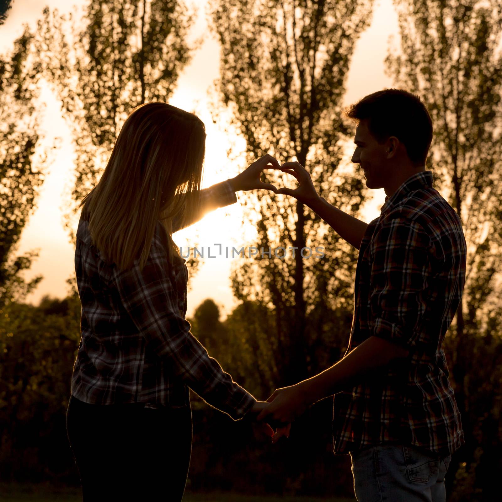 Young couple in love making promises of love