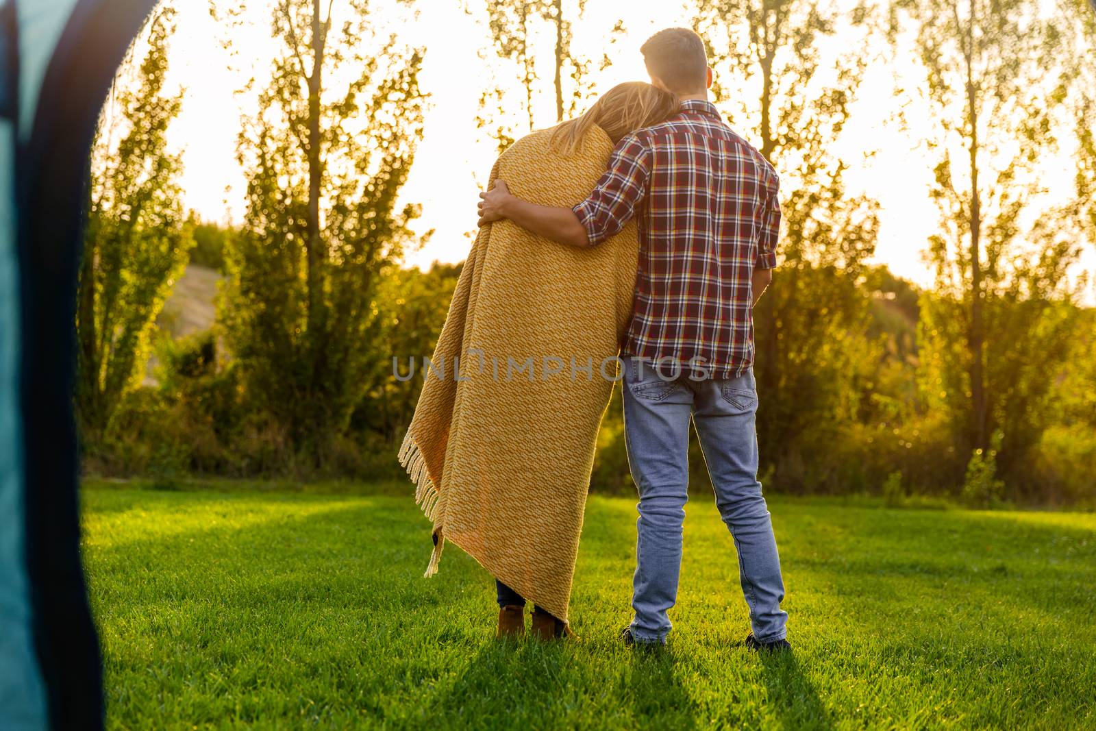 Young couple in love after waking up in the nature