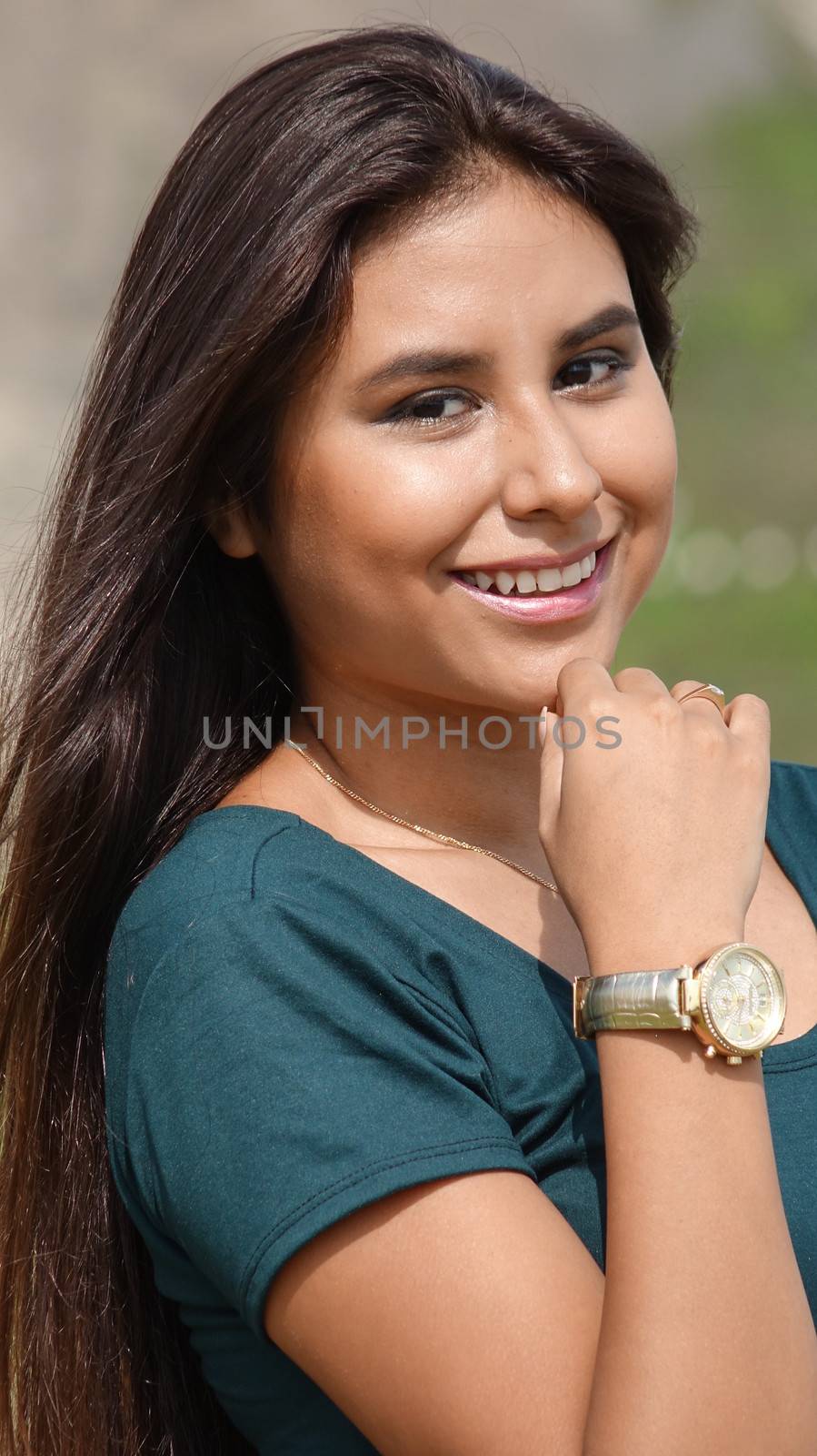 Teen Hispanic Female Wearing Watch