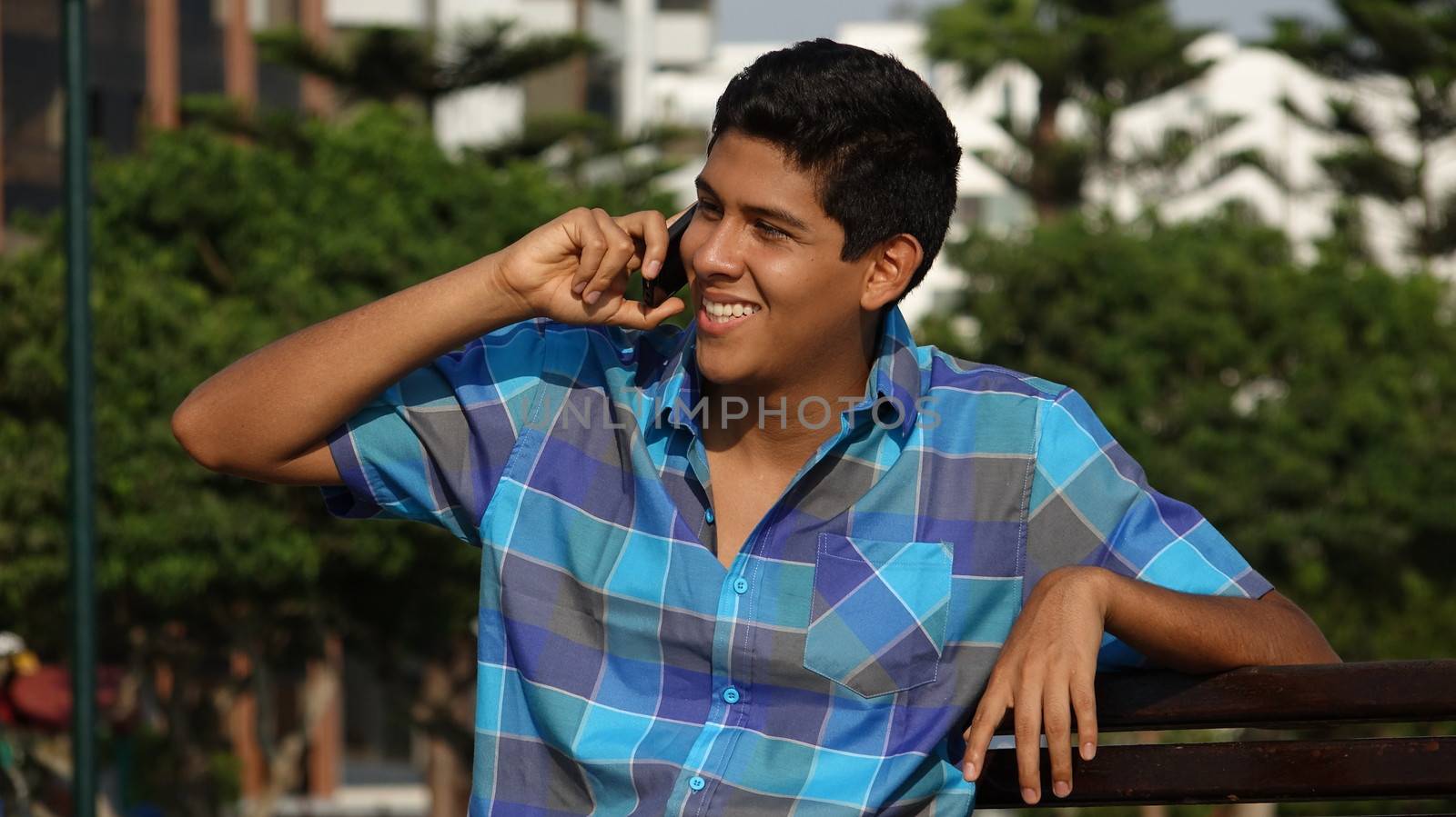 Happy Teen Using Cell Phone