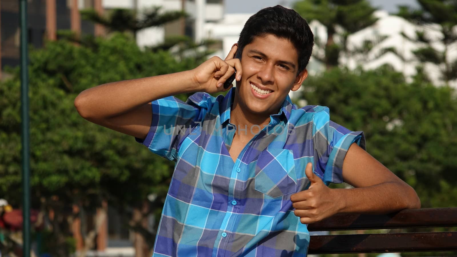 Teen Boy Success Phone Call by dtiberio