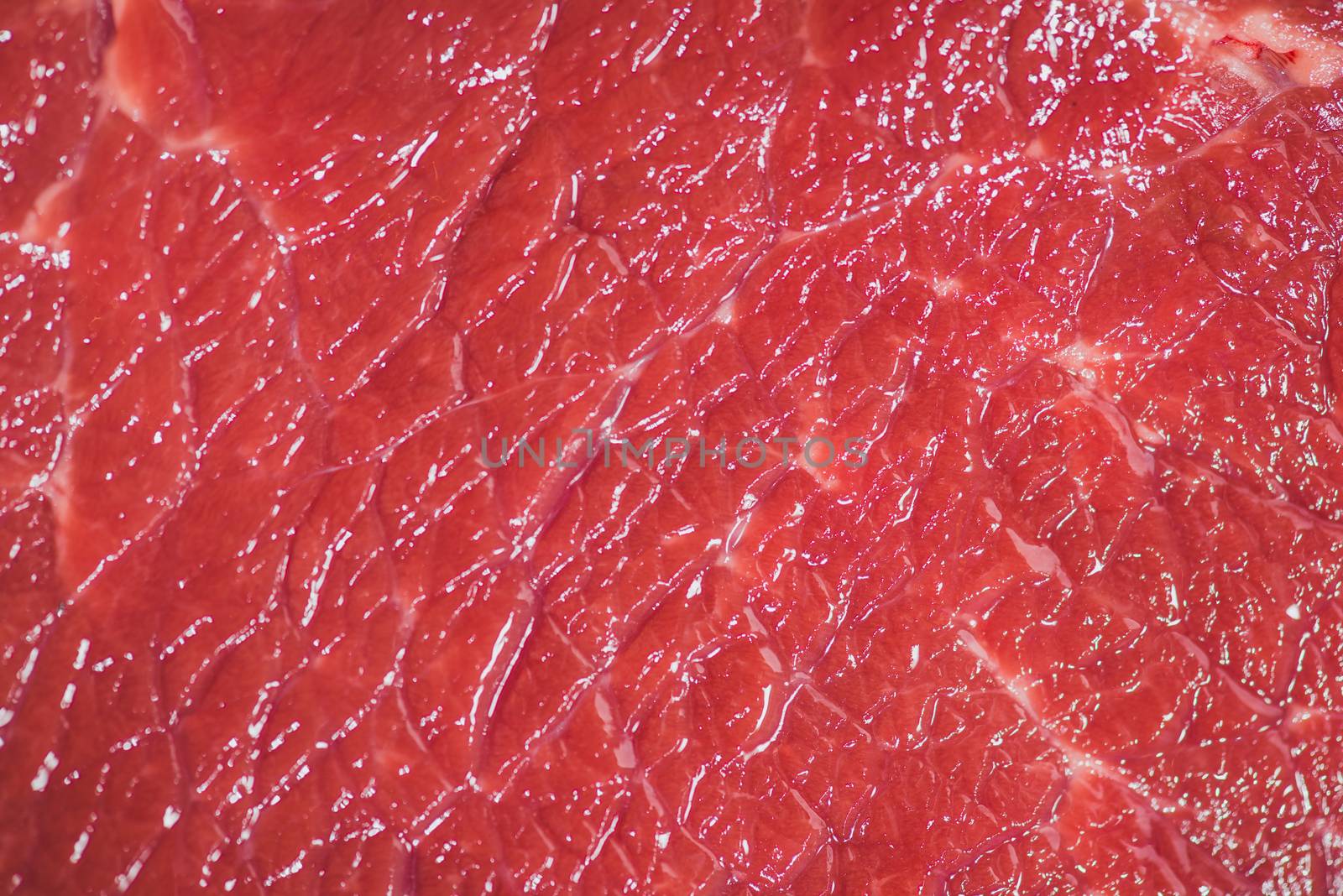 Close-up of raw beef texture background by makidotvn