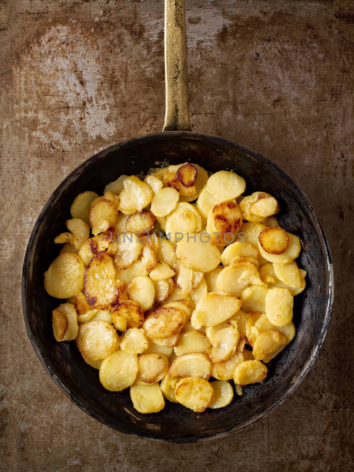 close up of rustic golden german pan fried potato bratkartofflen