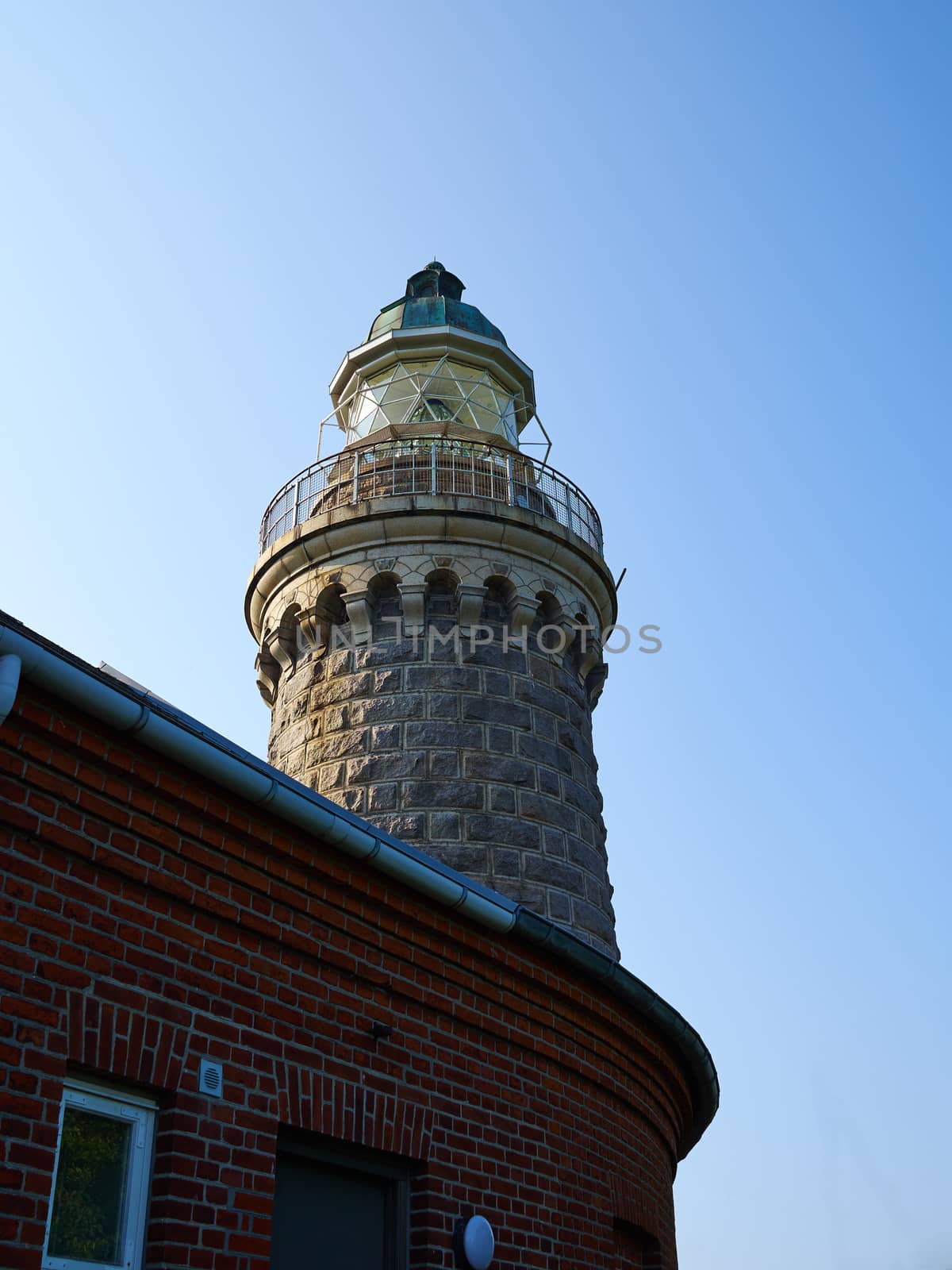 Old stone traditional lighthouse on the beach the island of Aeroe Denmark