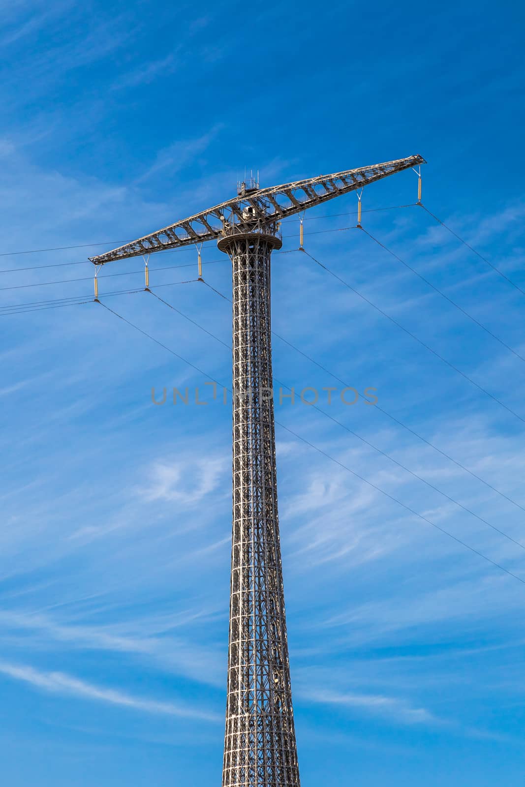 Communications tower with a beautiful blue sky