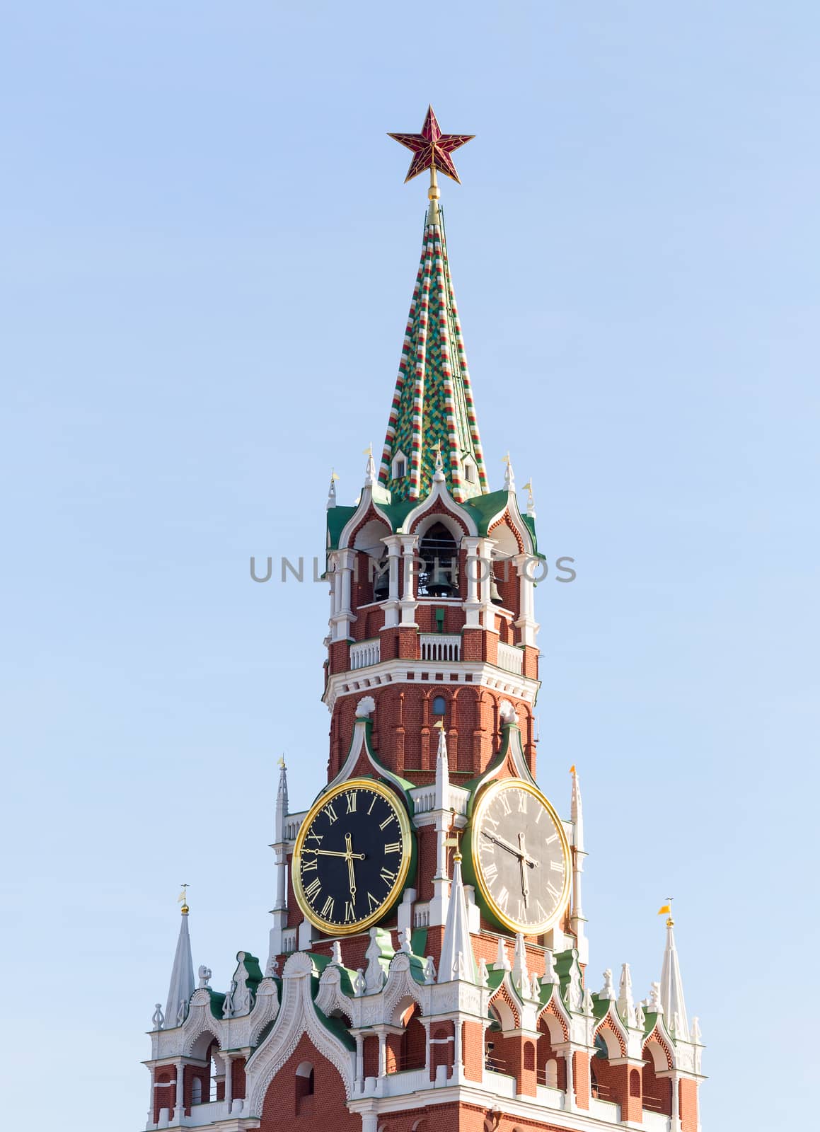 Spasskaya Tower of Moscow Kremlin on Red Square in Victory Day in Moscow, Russia by straannick