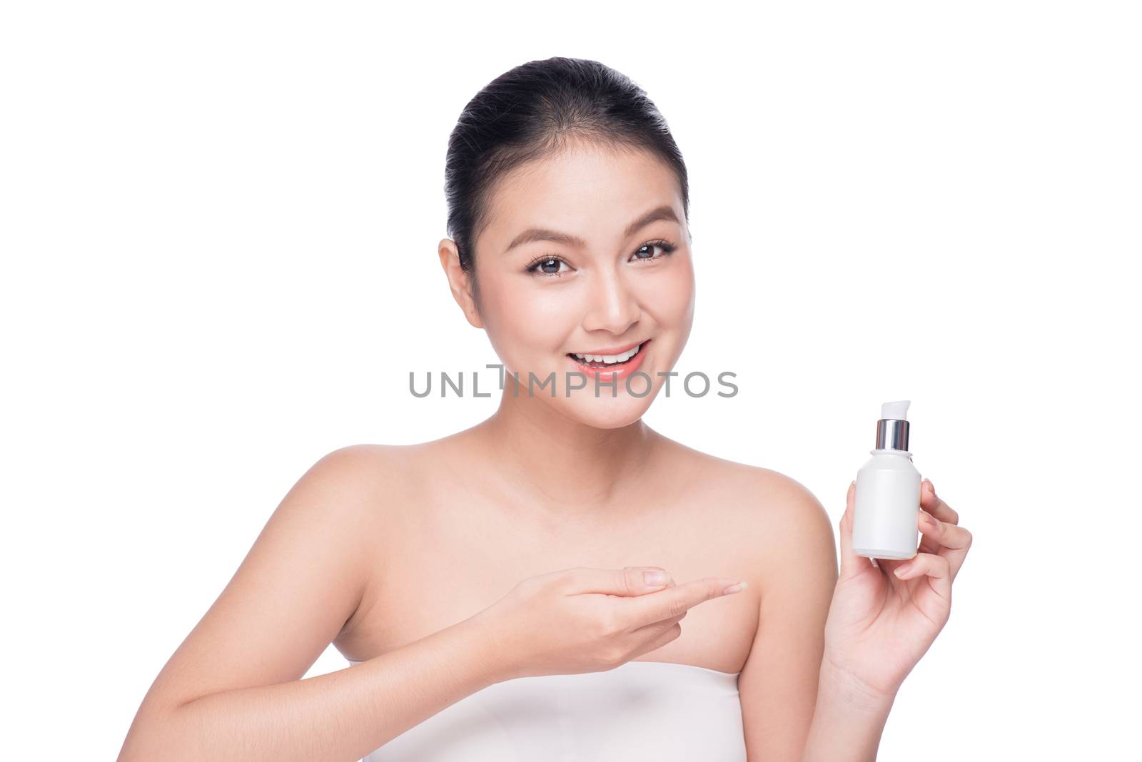 Beauty treatment. Asian woman holding serum moisturizing serum bottle