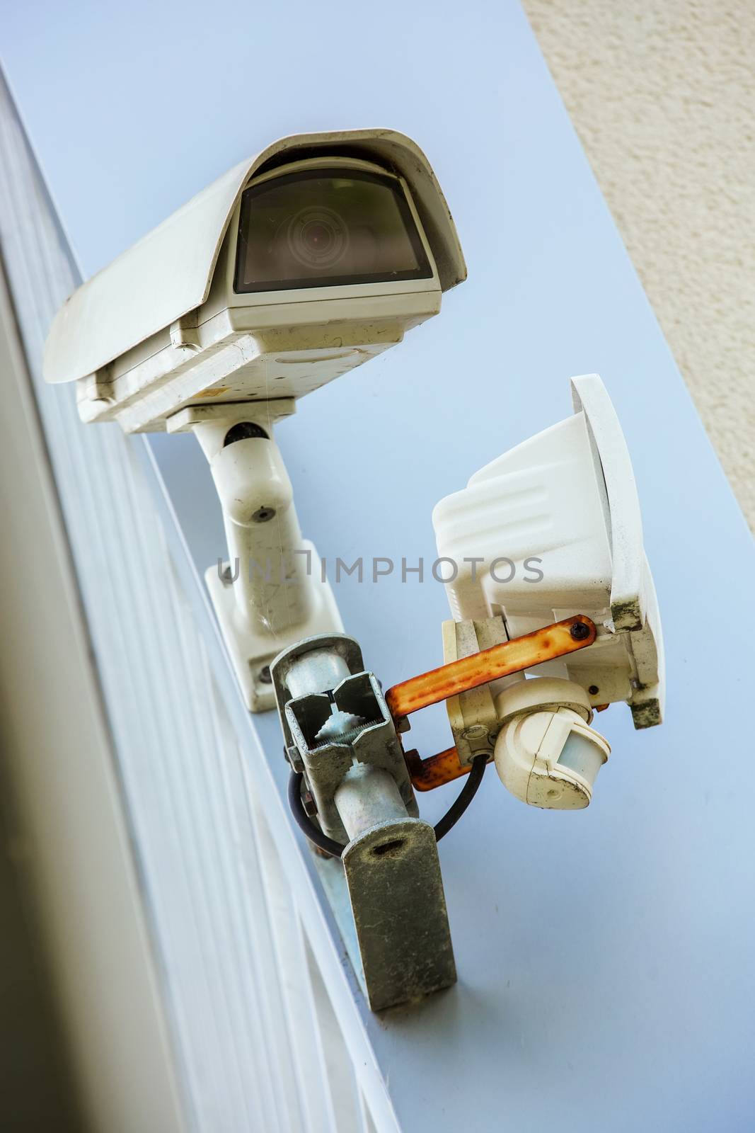 CCTV Security camera and urban video. Closeup view.