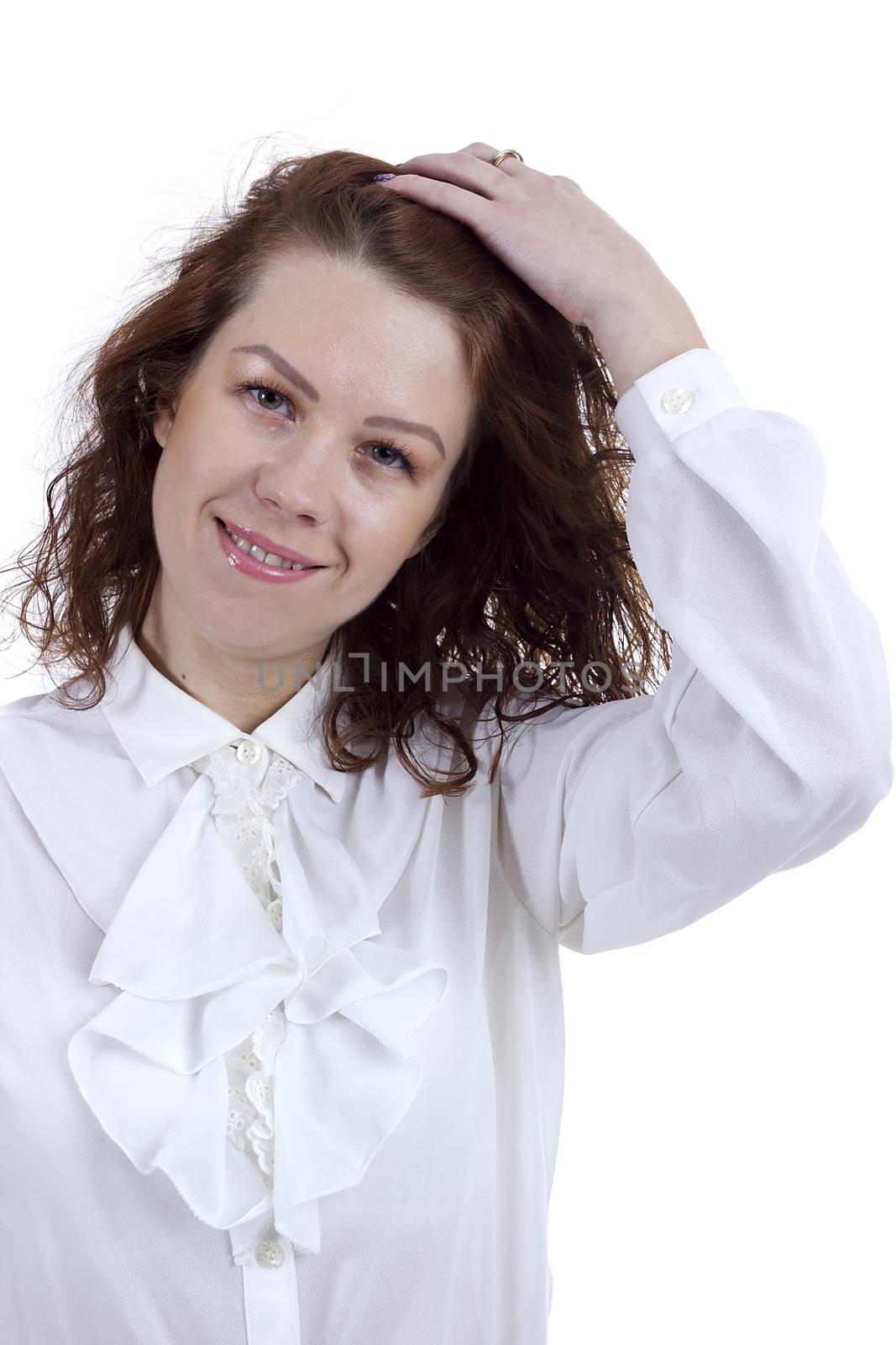 Beautiful girl straightens her hair, isolated on white background