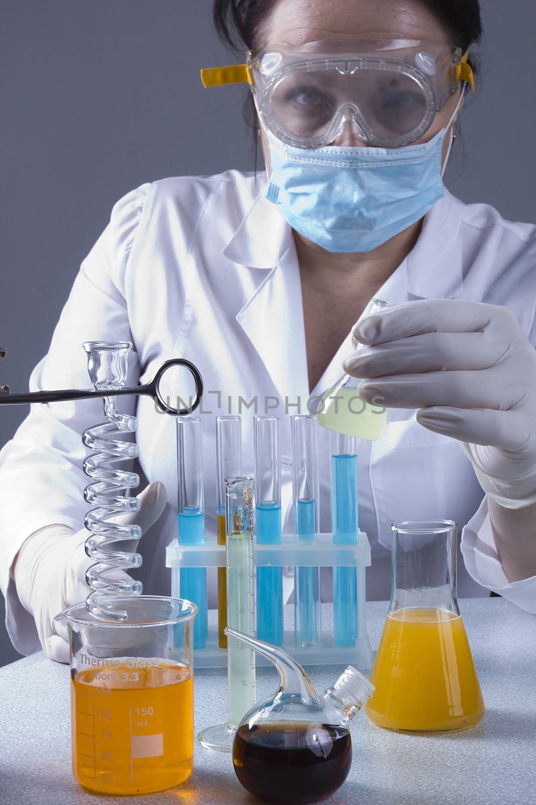 Adult lab assistant works in the laboratory