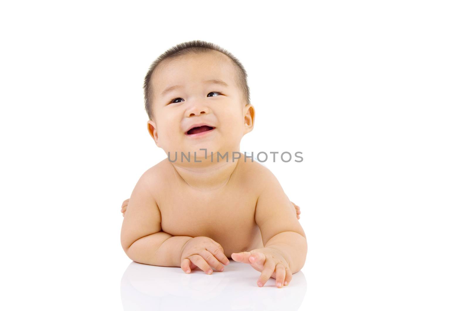 crawling cute asian baby boy in the studio