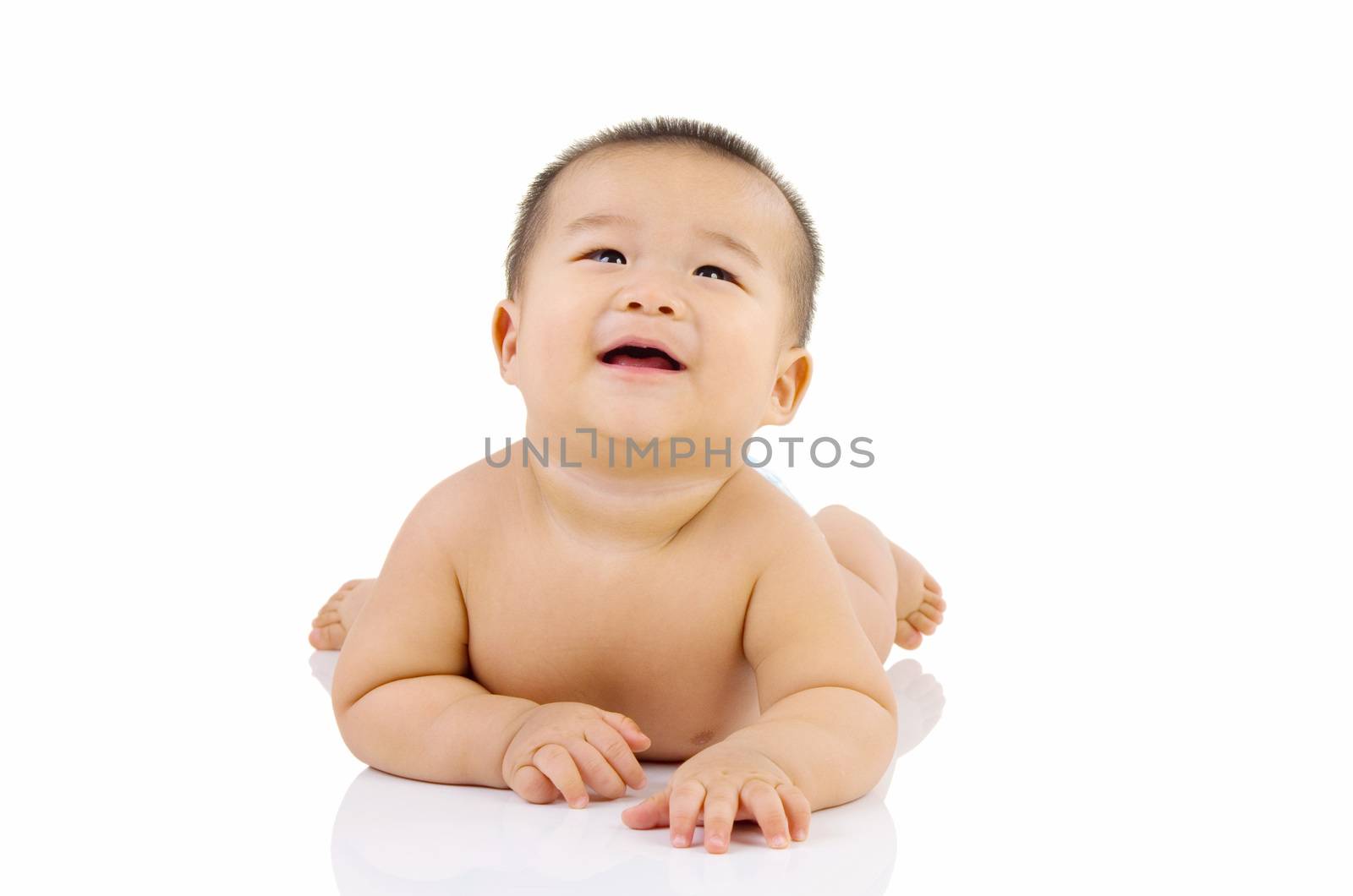 crawling cute asian baby boy in the studio