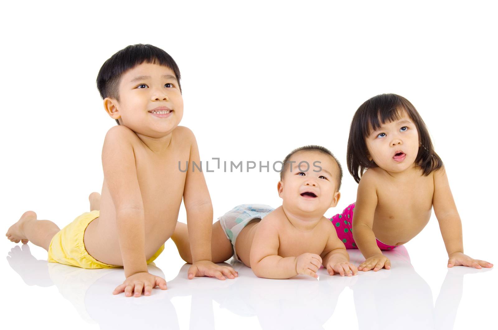 Portrait of lovely asian kids lying down on the floor