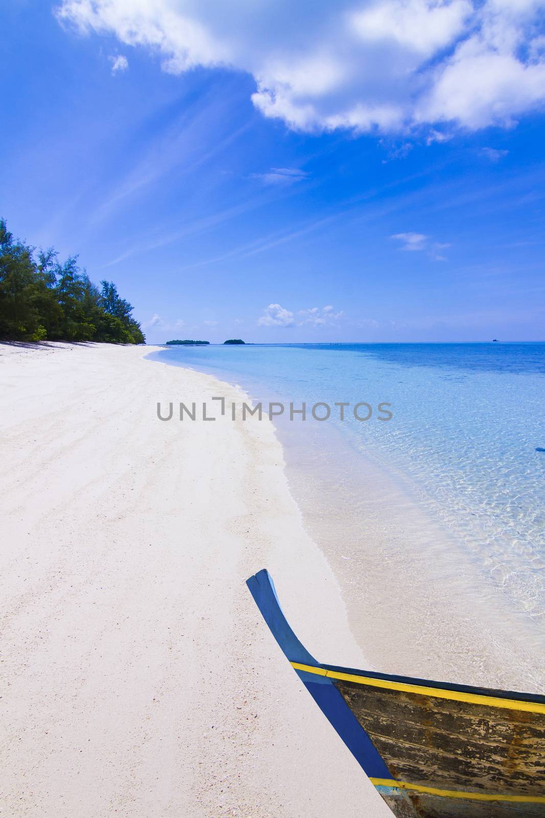 white Sand Beach and a ship at Kho Mat Sum Island Koh Samui, Thailand.