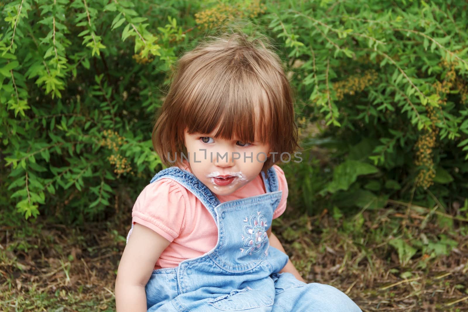 Photo of cute girl with icecream mouth in summer