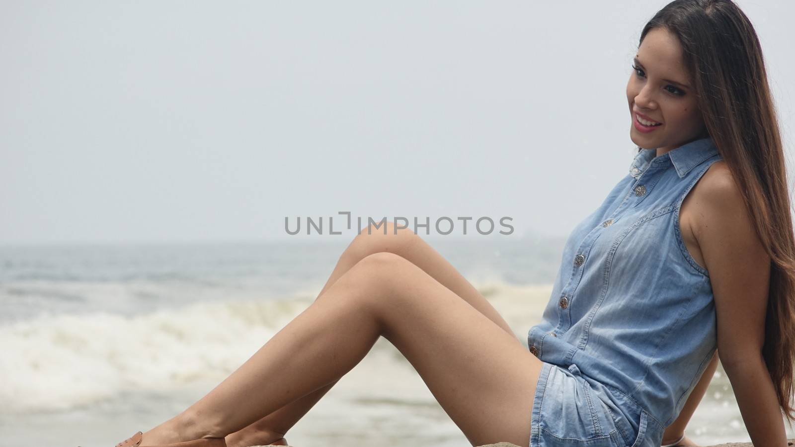 Female Teen Relaxing At Beach by dtiberio