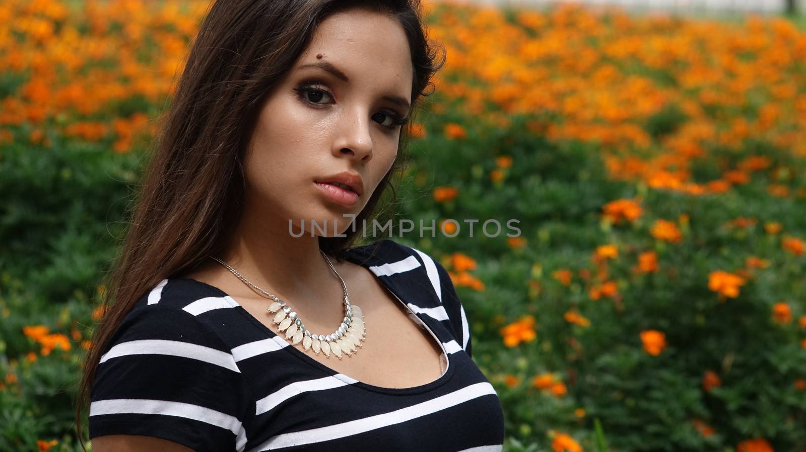 Serious Teen Girl In Meadow