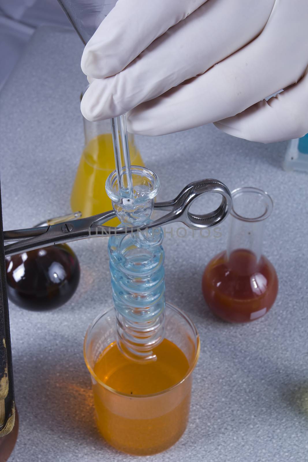 Hands chemist doing research in a laboratory