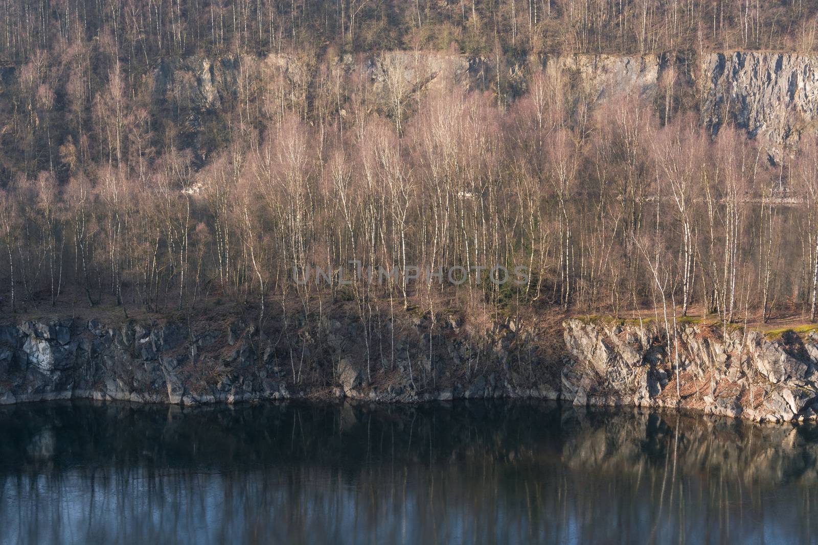 Panoramic view of an old open opencast mine of limestone works in Wuelfrath, Germany on a winter day.