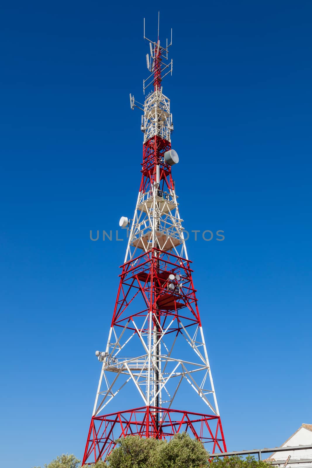 Communications tower with a beautiful blue sky on Puerto Real, Cadiz, Spain