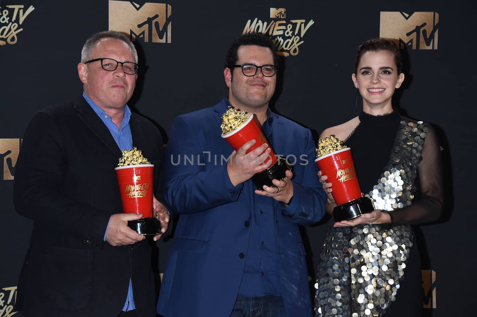 Bill Condon, Josh Gad, Emma Watson at the 2017 MTV Movie & TV Awards, Press Room, Shrine Auditorium, Los Angeles, CA 05-07-17