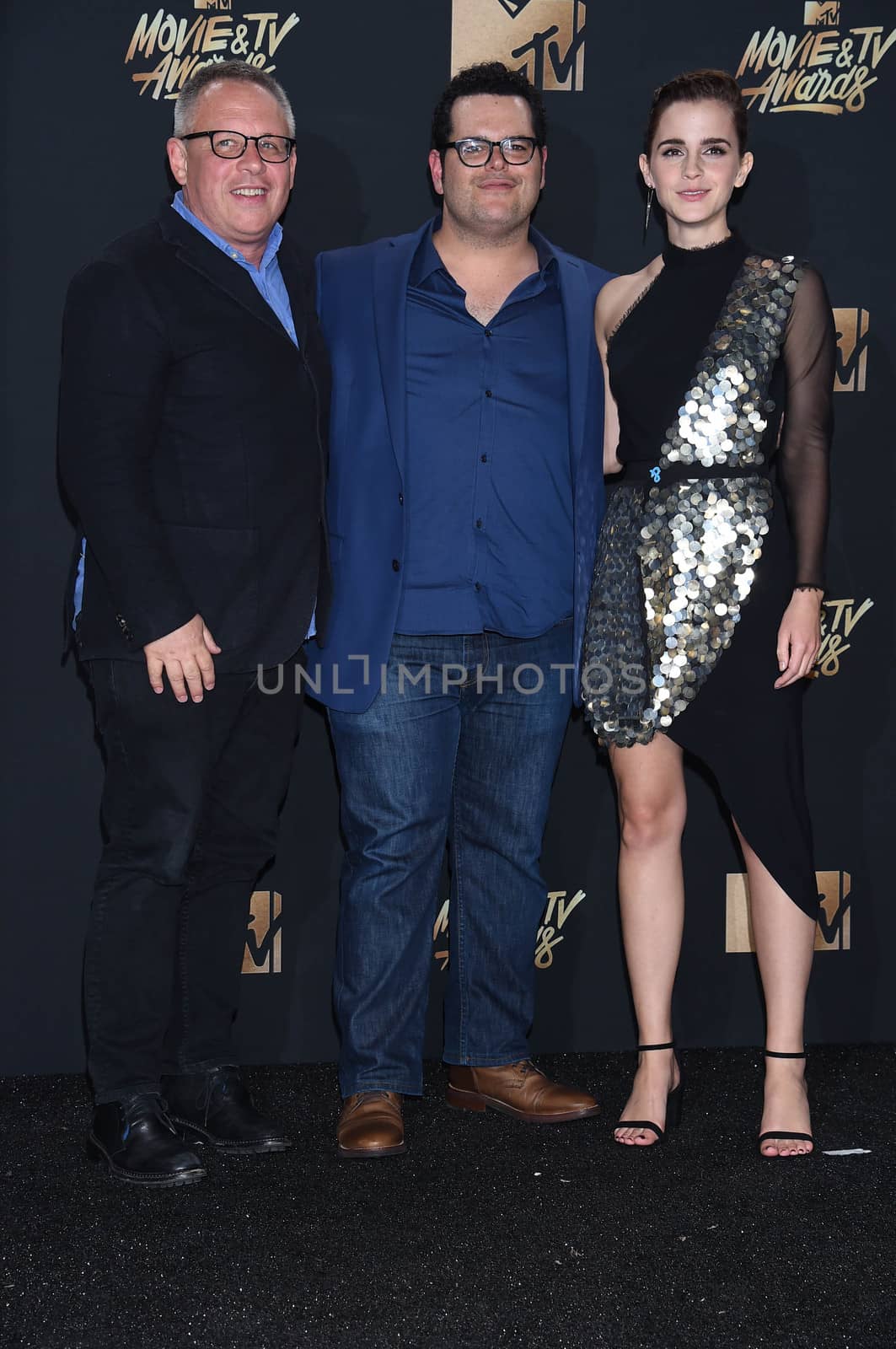 Bill Condon, Josh Gad, Emma Watson at the 2017 MTV Movie & TV Awards, Press Room, Shrine Auditorium, Los Angeles, CA 05-07-17