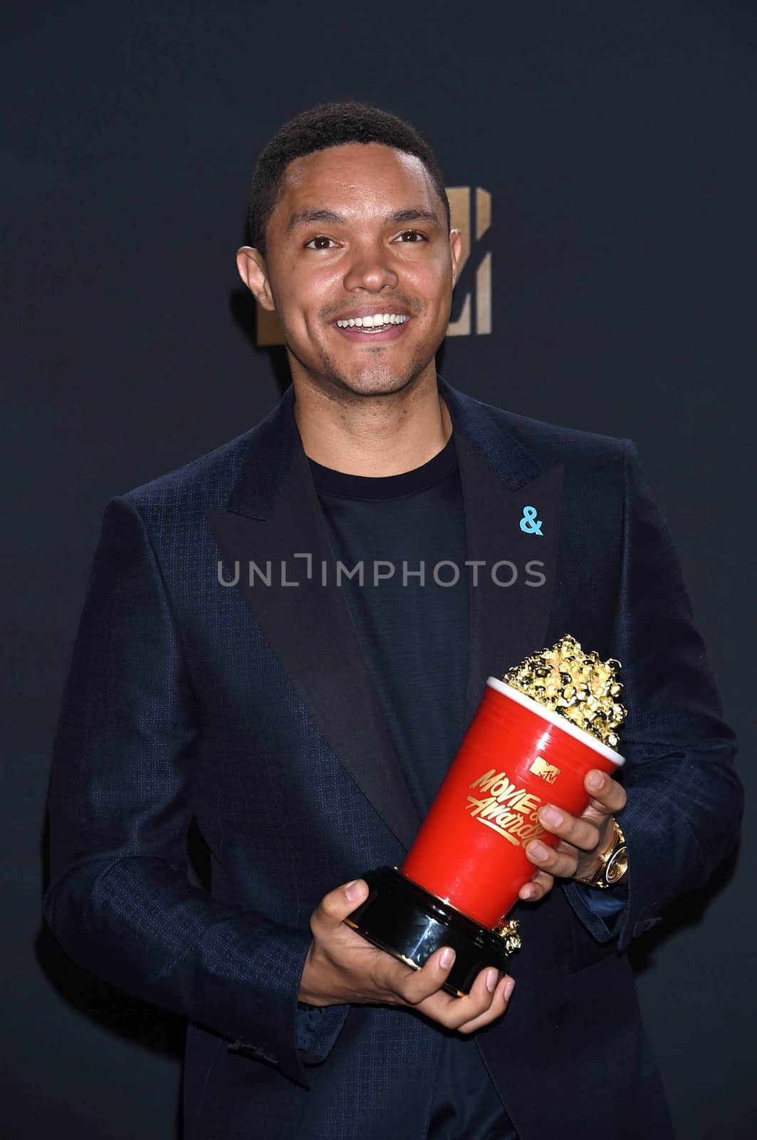 Trevor Noah at the 2017 MTV Movie & TV Awards, Press Room, Shrine Auditorium, Los Angeles, CA 05-07-17