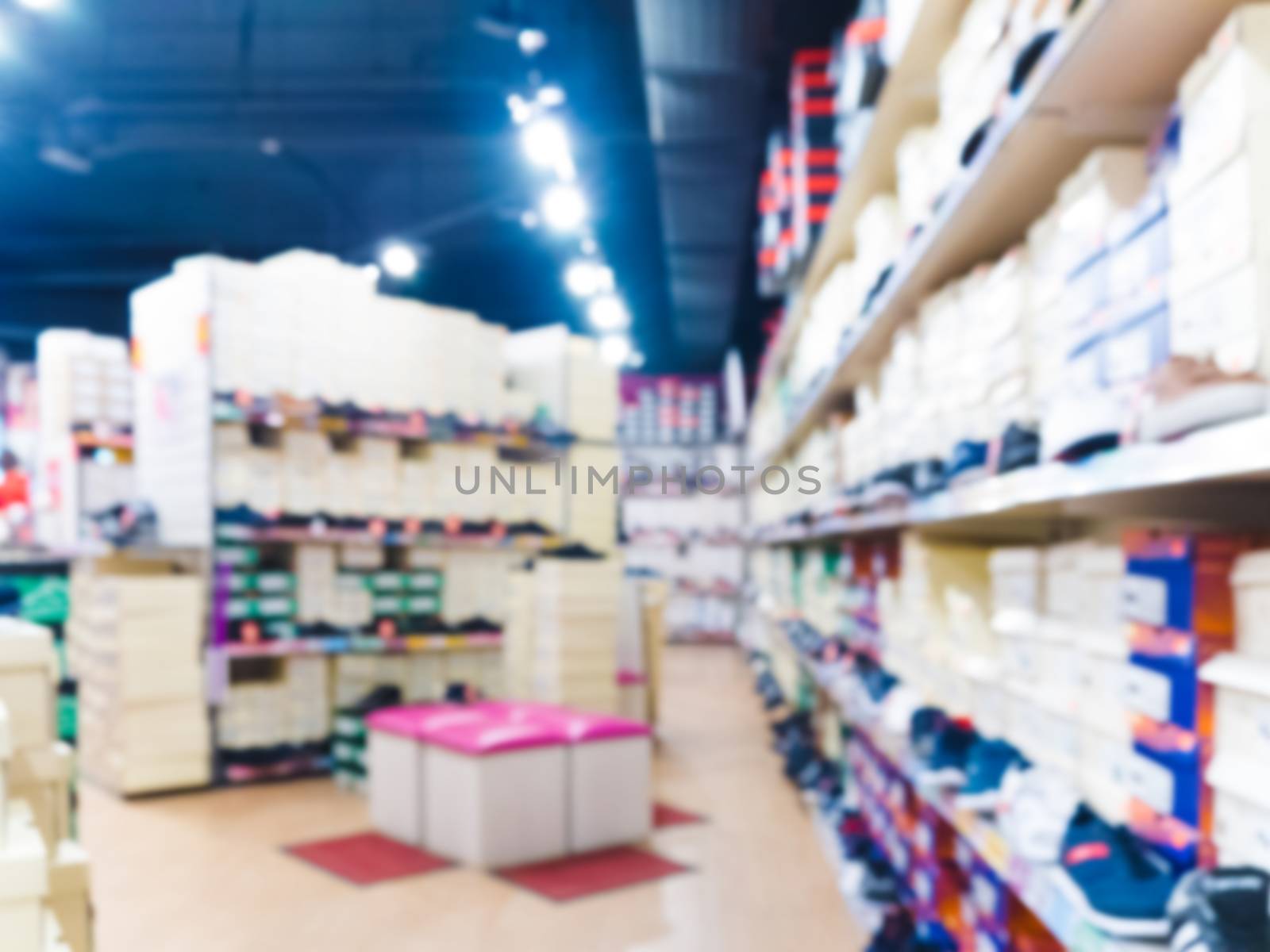 Blur image of shoes and accessories store interior as background