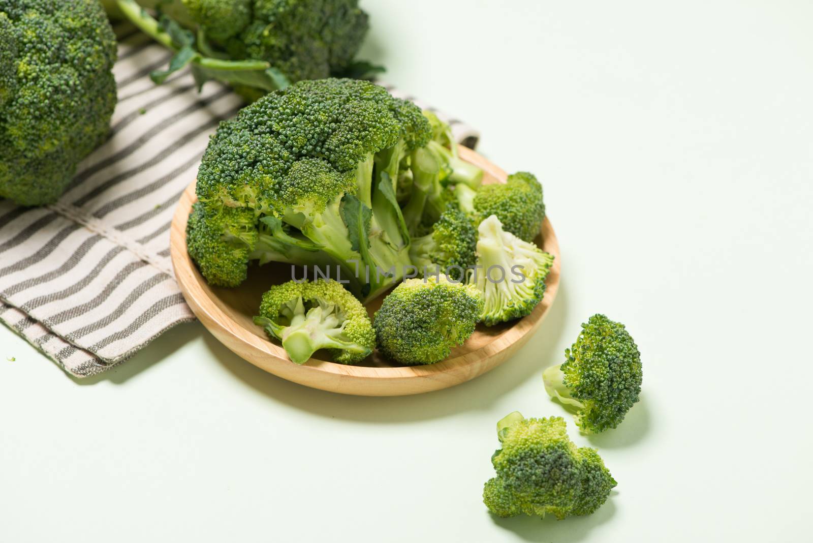 Modern style of the Broccoli isolated on green background.
