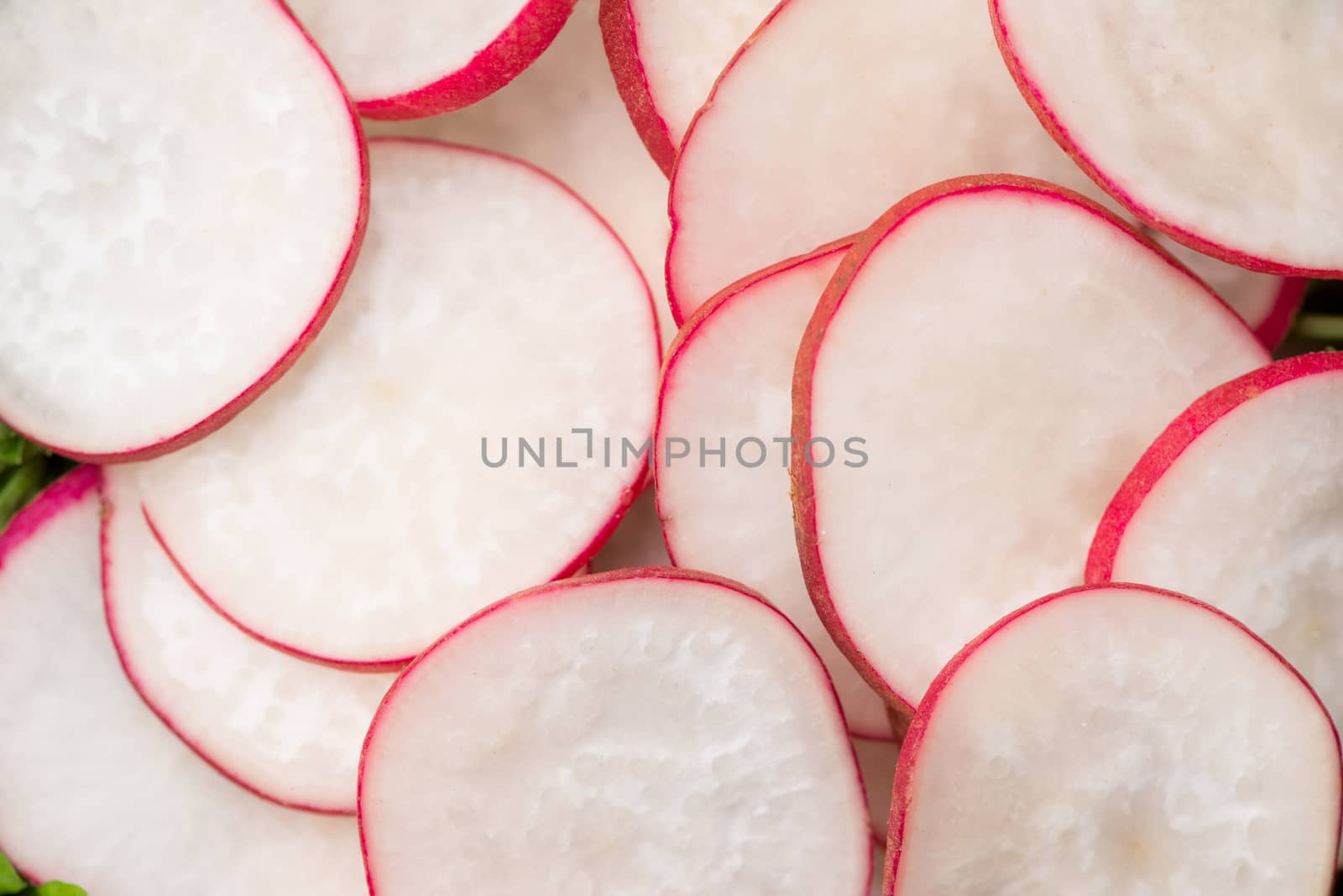 Homemade fresh radishes vegetable salad on table. Close-up. by makidotvn