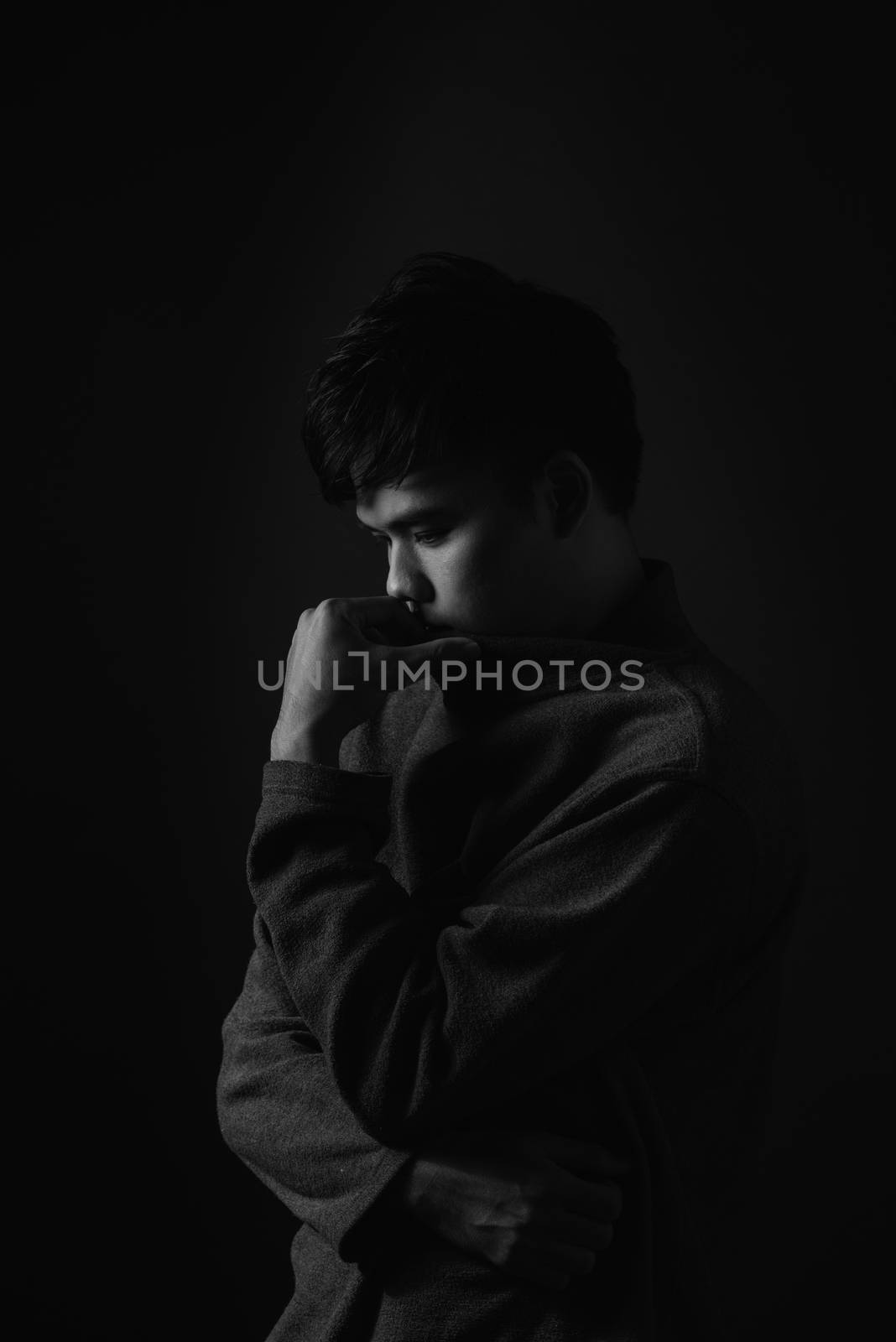 Portrait of sad young asian men. Sadness