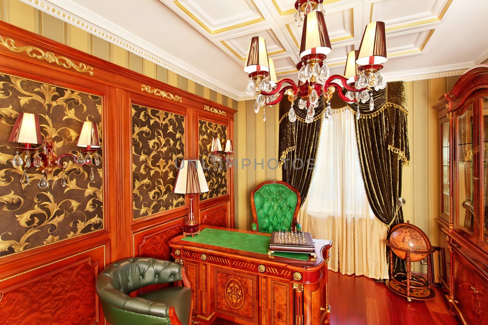 Classical interior working space with antique furniture