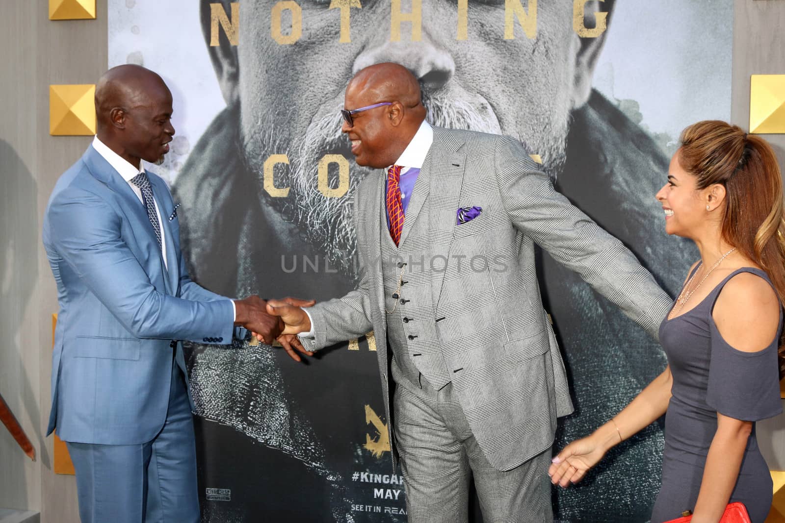 Djimon Hounsou, Chi McBride, Julissa McBride
at the "King Arthur Legend of the Sword" World Premiere, TCL Chinese Theater IMAX, Hollywood, CA 05-08-17/ImageCollect by ImageCollect