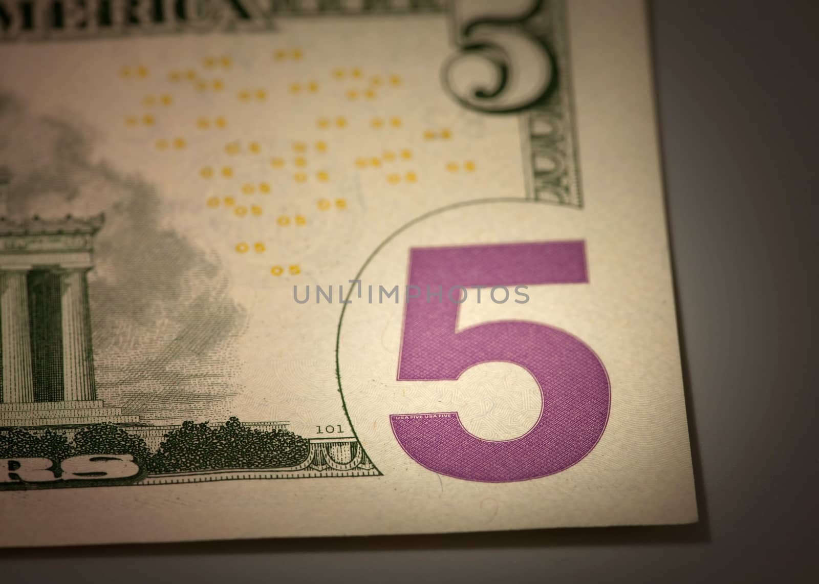 number 5 on the dollar bill macro shot