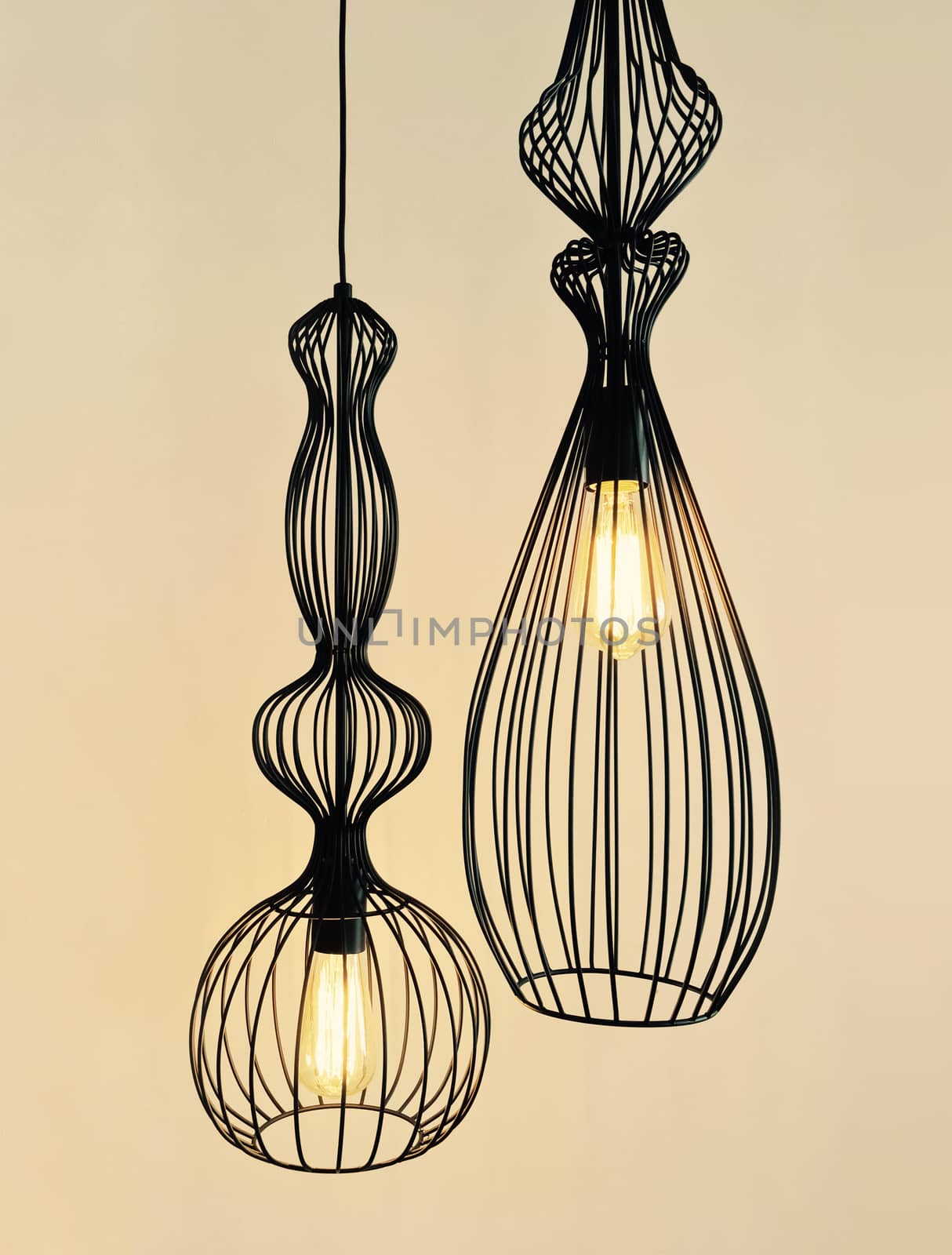 Pendant lamps made of black metal wire. Modern design.